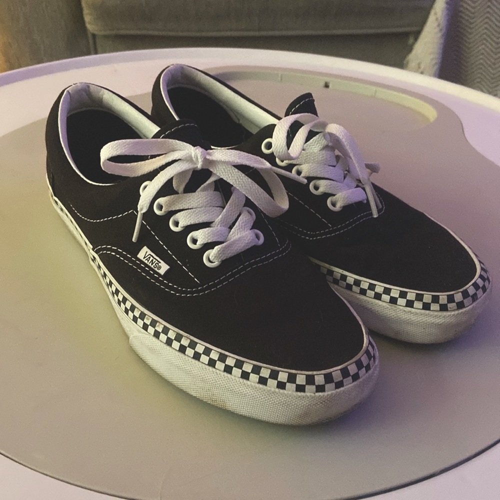 Vans Authentic, with checkered stripe along the rubber outsoles